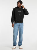 29109603_pe-2025-guess-jeans-m5rq38-kcpr1-embro-swt-hdjblk-black_1_p.jpg
